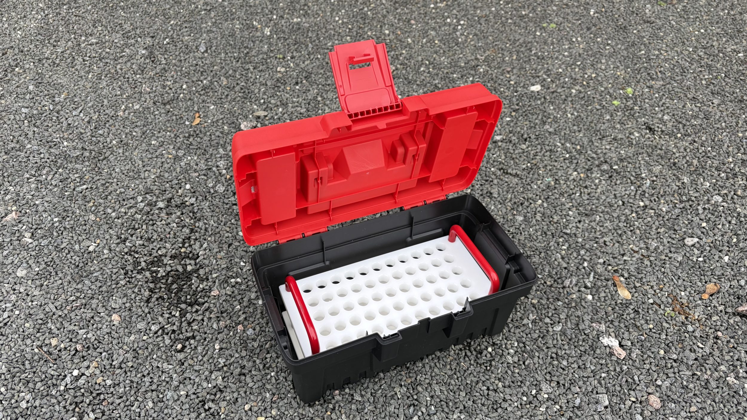Custom white sample tube rack fitted securely inside the carrying case