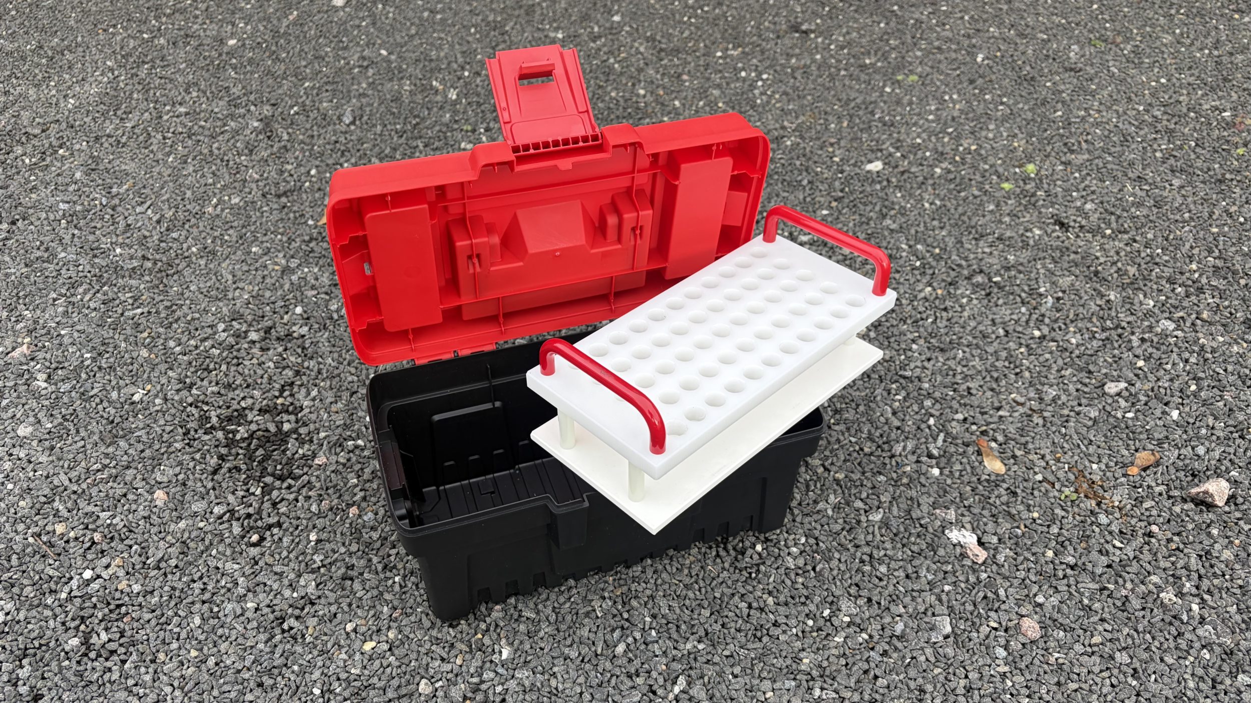 Two-tier bespoke laboratory sample rack lifted from its carrying case